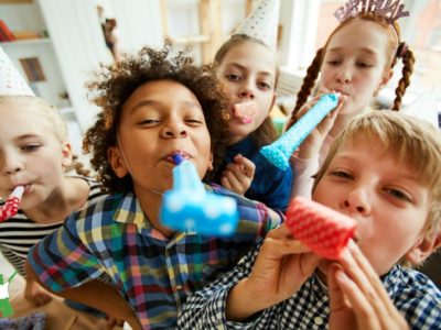 five children enjoying healthy fun at a birthday party