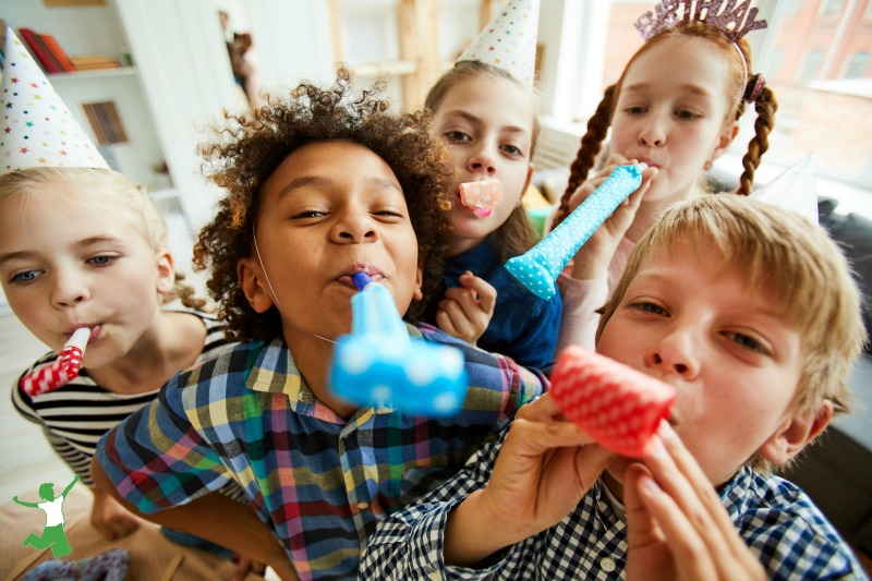five children enjoying healthy fun at a birthday party