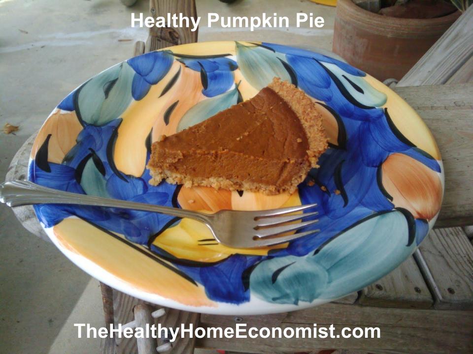 slice of dairy free pumpkin pie on a multi-colored plate