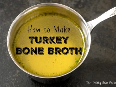 homemade turkey bone stock in a stainless saucepan