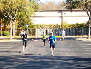 people doing crossfit endurance on a road