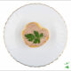 chicken liver and bacon pate spread on toast with parsley sprig