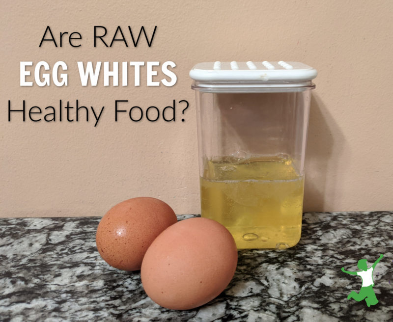 raw eggs whites in a clear container on a granite table