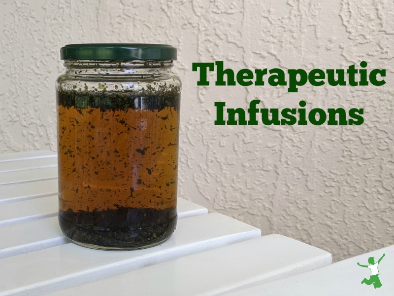 herbal tea infusion in a glass jar on a table