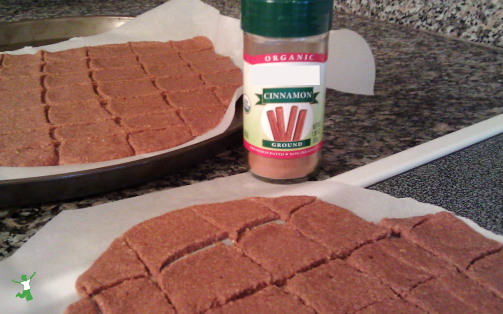 homemade cinnamon crackers on baking sheets