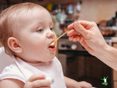 baby eating best first food in high chair