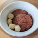 macadamia nut pudding in white bowl