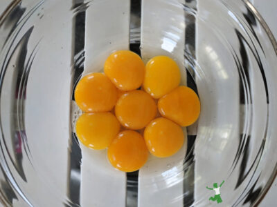 healthy cholesterol in egg yolks in glass bowl