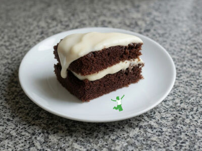 cake with real buttercream frosting on a white plate