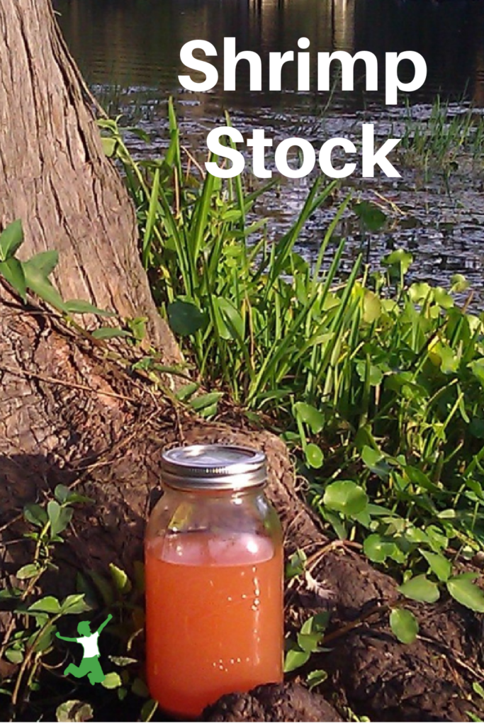 pink shrimp stock in jar by waterfront