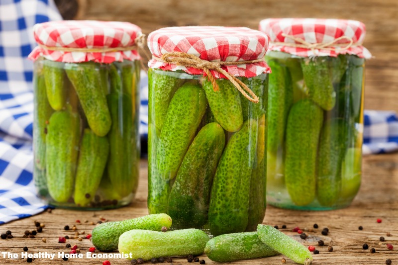 pickled and fermented pickles in quart mason jars