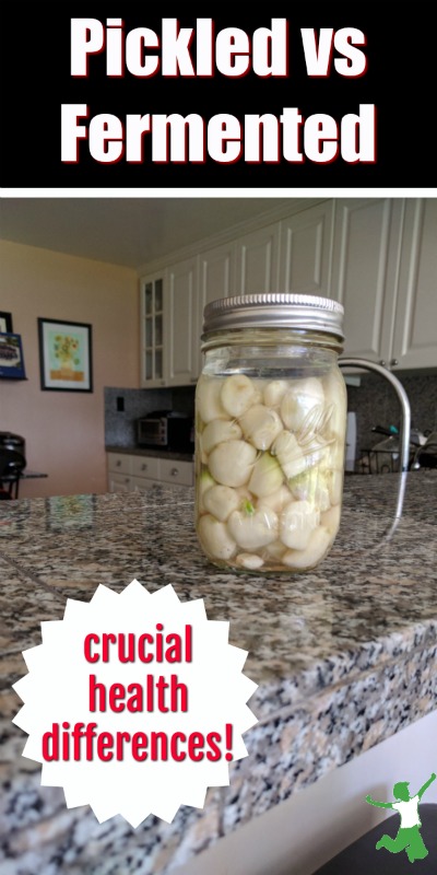 fermented garlic in a jar on the counter