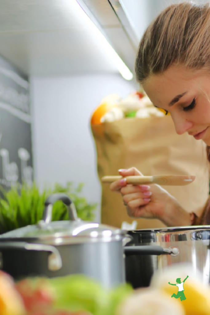 Italian vegetable soup with miso base simmering on stovetop