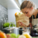 woman cooking Italian vegetable soup with miso base