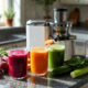 fresh pressed juices with vegetables on granite counter