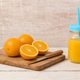 homemade orangina in a mason jar with straw