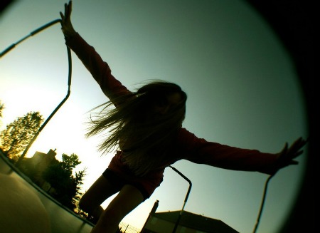 woman rebounding at dawn