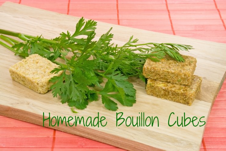 lovage leaves and healthy homemade bouillon cubes on a cutting board