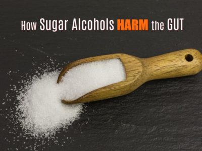 gut harming sugar alcohol on a wooden scoop