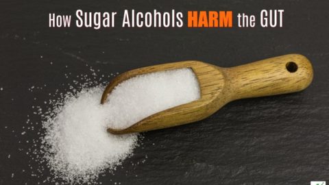 gut harming sugar alcohol on a wooden scoop