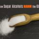 gut harming sugar alcohol on a wooden scoop