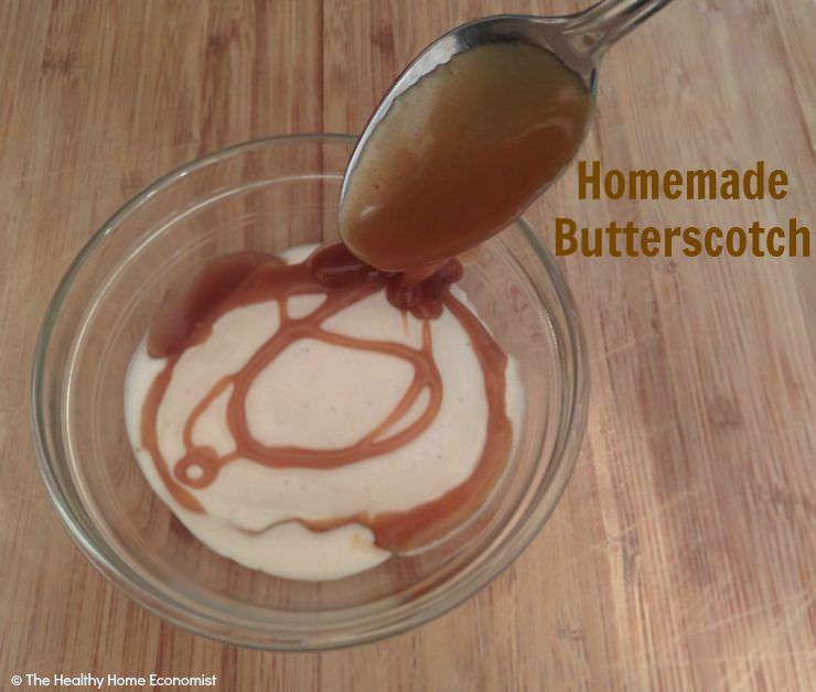homemade butterscotch drizzled over a bowl of vanilla ice cream