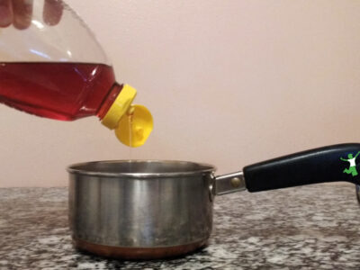 cooked raw honey in a saucepan