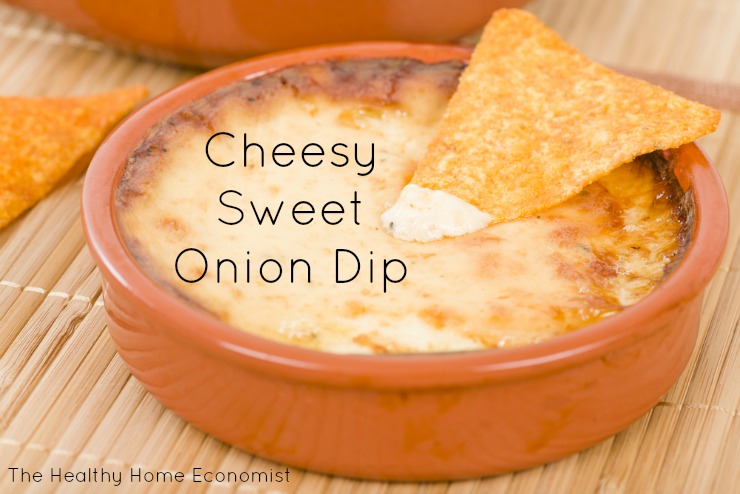 sweet onion dip with cheese in a terra cotta bowl