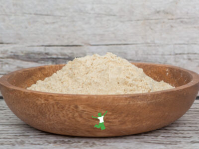 hormone balancing maca powder in a wooden bowl