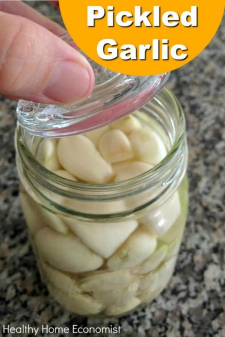 fermented garlic cloves in a jar