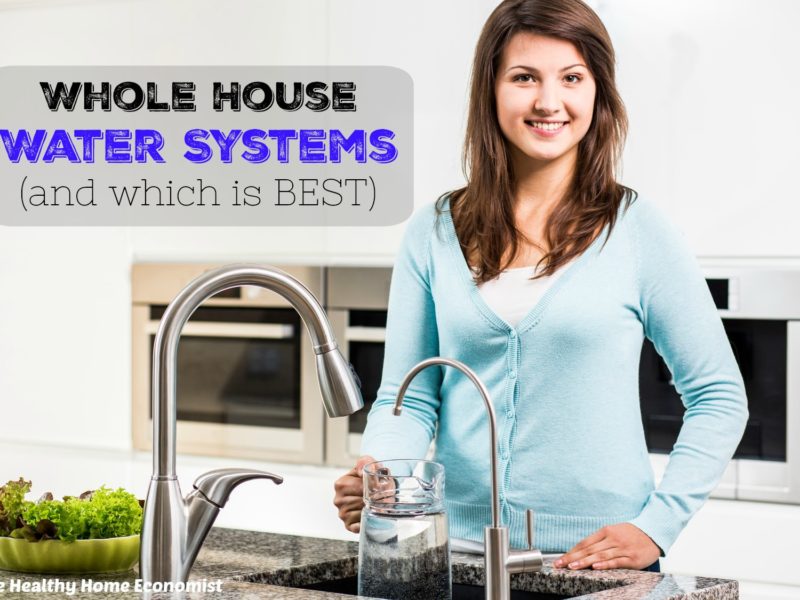 woman using a whole house water filter in the kitchen