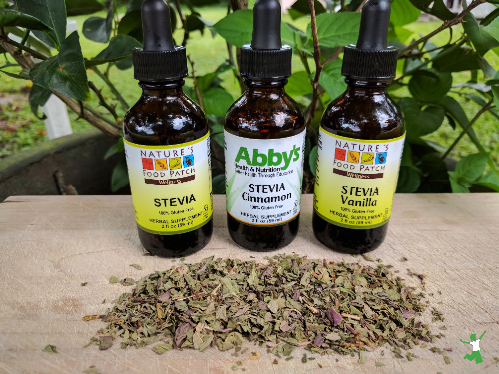 safe green leaf and bottles of liquid stevia