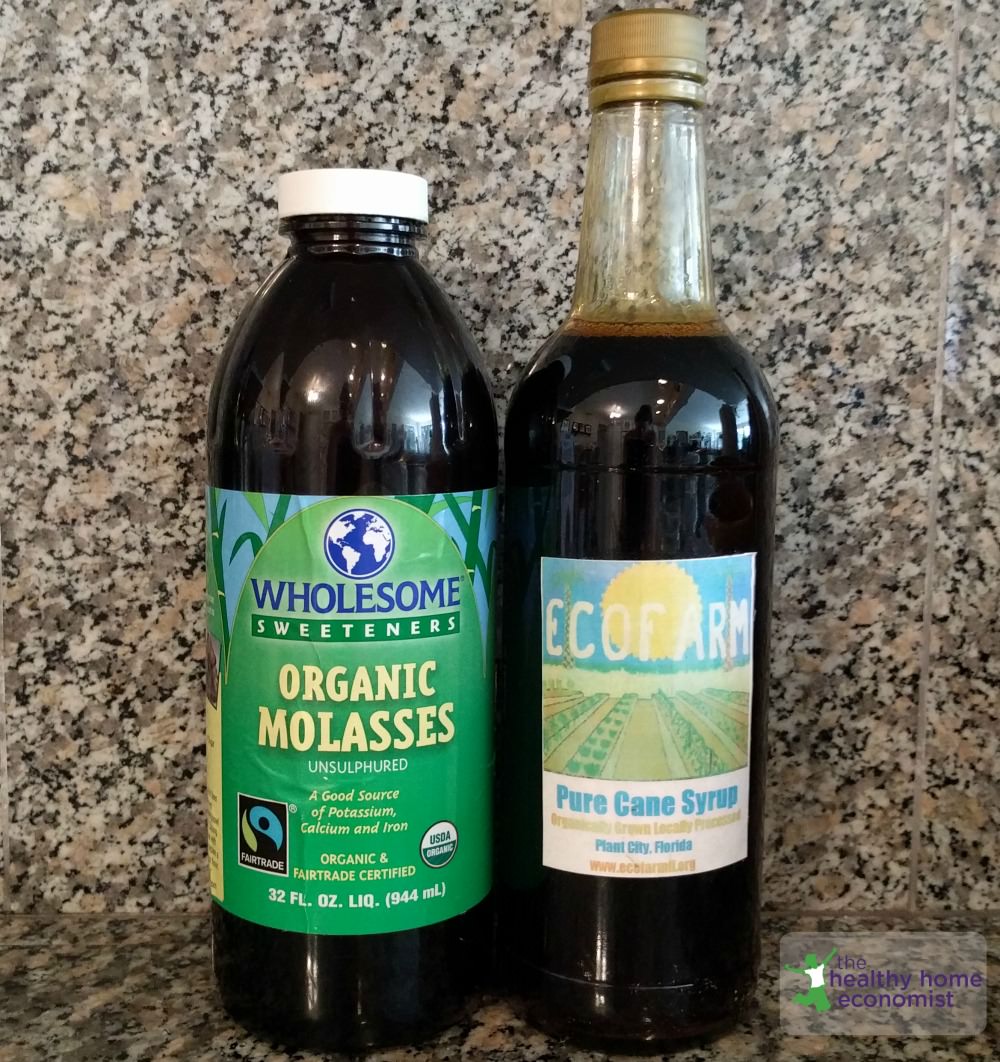 bottles of organic molasses and cane syrup on counter