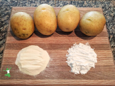 potato starch and flour on a wooden cutting board