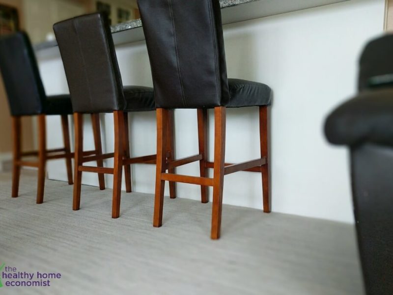 light gray wool carpet in a living room with leather furniture