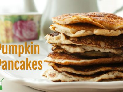 stack of low carb keto pumpkin pancakes on a white plate
