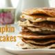 stack of low carb keto pumpkin pancakes on a white plate