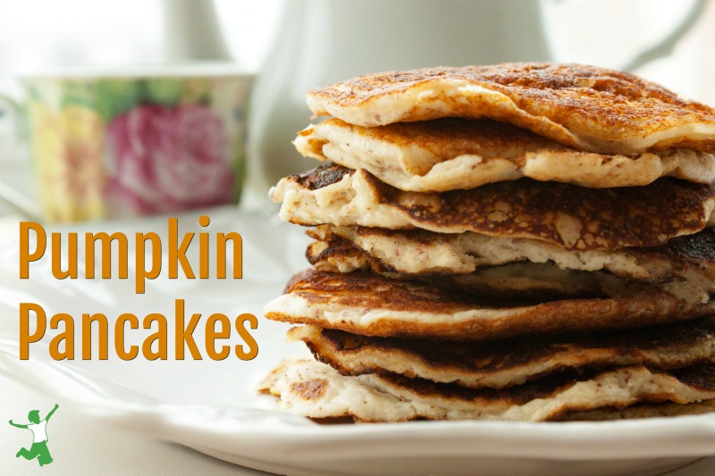 stack of low carb keto pumpkin pancakes on a white plate