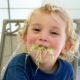 child eating alfalfa