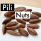 pili nuts on a white plate