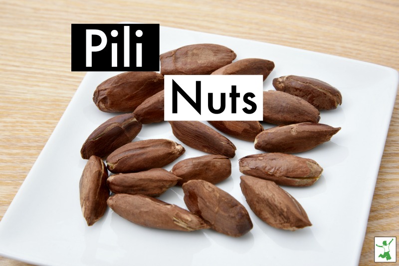 pili nuts on a white plate