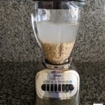 rolled oats and water in a blender