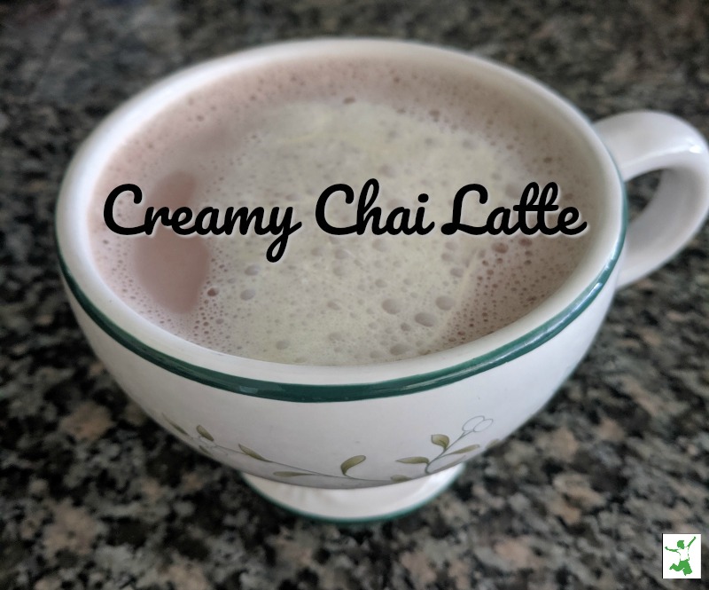 frothy chai latte in a large mug