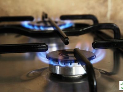 gas cooktop with two lit burners