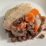 piece of Shepherd's Pie on a white plate