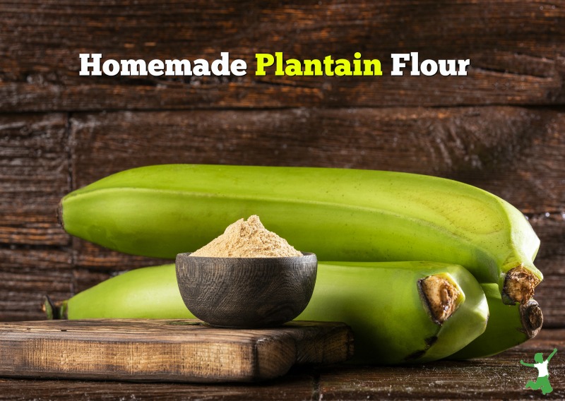 two unripe plantains and flour on a cutting board