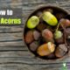 acorns in a bowl on a wooden table