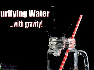 gravity filtered water in a glass with a straw