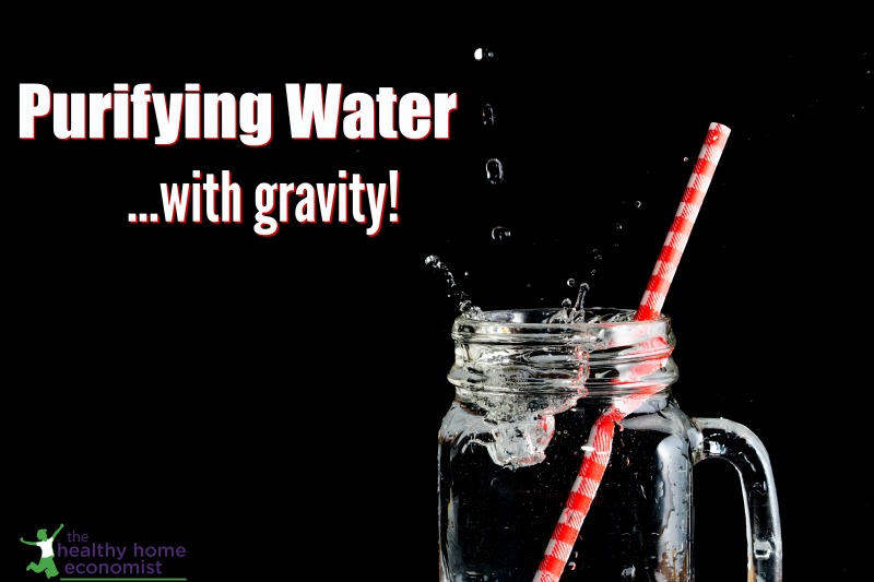 gravity filtered water in a glass with a straw