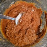 smooth pumpkin bread batter in a glass bowl